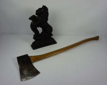 A cast iron doorstop in form of lion rampant, 39cm high; together with an Elwell 4.5 felling axe (