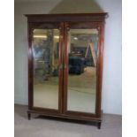 A George III style mahogany double compactum wardrobe, by Paterson, Smith & Innes, Edinburgh, with