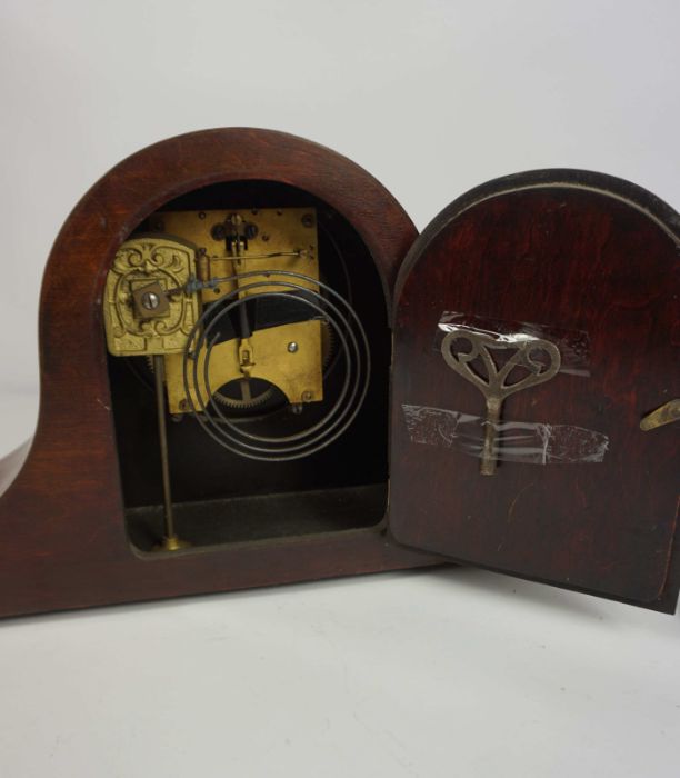 A mahogany cased mantel clock, early 20th century, with arched case, 24cm high, 43cm wide, - Image 4 of 5