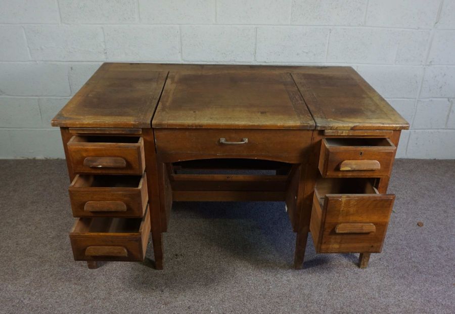 An oak typists desk, early 20th century, the rectangular top with folding and recessed typewriter - Image 2 of 7