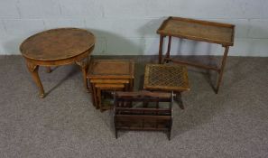 A small walnut veneered coffee table, with a small nest of tables, tray topped table, magazine stand