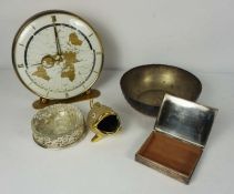 An assortment of objects including a Kundo desk clock, with World map face, a white metal