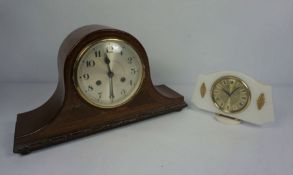 A mahogany cased mantel clock, early 20th century, with arched case, 24cm high, 43cm wide,
