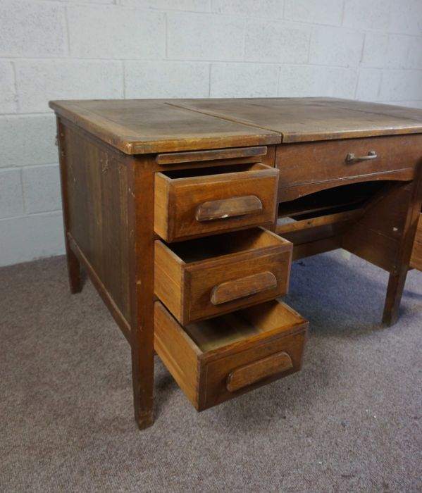 An oak typists desk, early 20th century, the rectangular top with folding and recessed typewriter - Image 3 of 7