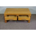 A modern oak coffee table, with two drawers, 46cm high, 110cm wide