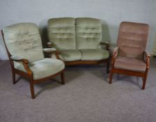 A ‘Cintique’ two seat settee and matching armchair, together with another armchair (all with 1988