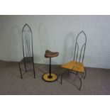 Two Contemporary Gothic iron framed high backed chairs, one with an oak seat, together with an