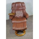 An Ekornes ‘Stressless’ leather and bentwood reclining chair and footstool, Norwegian, contemporary,