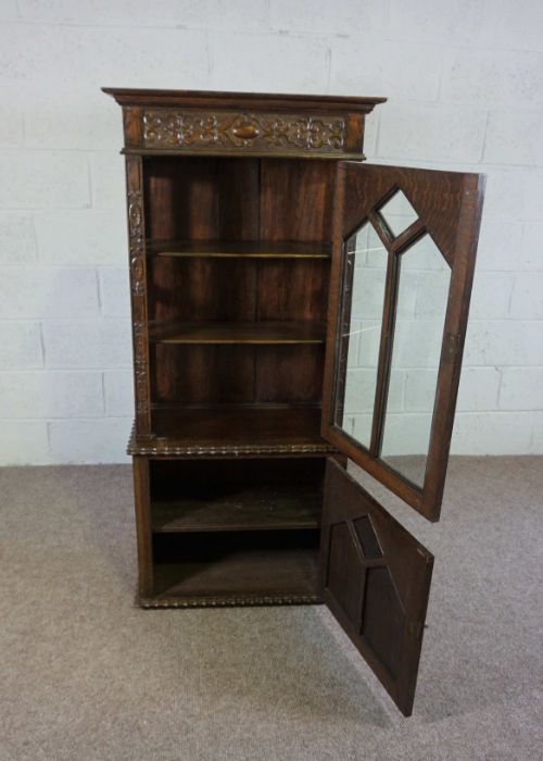 A small oak Jacobean style china cabinet, circa 1900, the top with a single glazed cabinet door, - Image 4 of 5