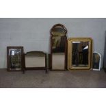 Five assorted mirrors, including an octagonal gilt framed wall mirror, a toilet mirror, with