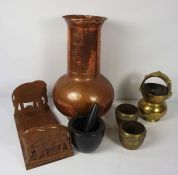 A large copper urn, 43cm high; together with a folding book stand, pestle & mortar and a small