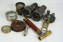 A collection of optical instruments, including a small 19th century folding brass and mahogany
