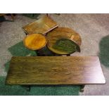 A small oak framed trestle table, modern, together with three other small occasional tables and a