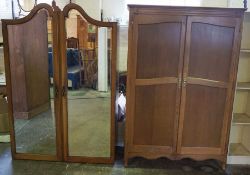 An oak panelled double wardrobe, together with a double mirrored wardrobe (lacking base) (2)