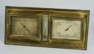 An Art Deco silvered brass cased desk alarm clock and barometer, with central thermometer, the
