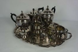 A quantity of assorted silver plate, including a George III style tea tray, a presentation salver,