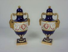 A pair of Victorian Minton classical porcelain vases, in the manner of Sevres, with indistinct