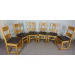 A set of six oak ladder back dining chairs, contemporary, of solid frame construction, with