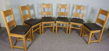 A set of six oak ladder back dining chairs, contemporary, of solid frame construction, with