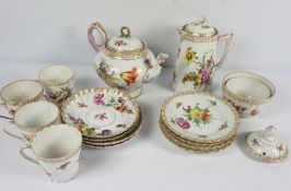 A Dresden porcelain part tea service, 19th century, decorated with flowers on a white ground, all