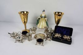 A small quantity of assorted silver and silver plated condiments, including a pair of cased open