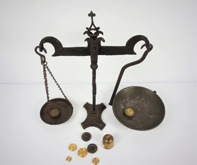 A wrought iron set of balance scales, 19th century, with nine assorted and graduated weights (10) - Image 4 of 6