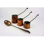 A graduated set of three Victorian copper, brass and wrought iron cider measures, together with a