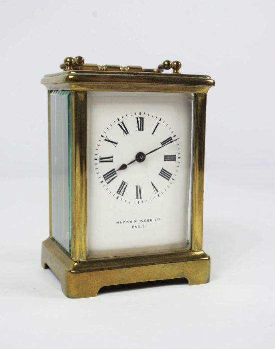 A small brass cased carriage clock, signed Mappin & Webb Ltd, Paris, in a standard plain four - Image 2 of 4