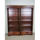 Two modern open bookcases, each with two small drawers, 191cm high, 79cm wide