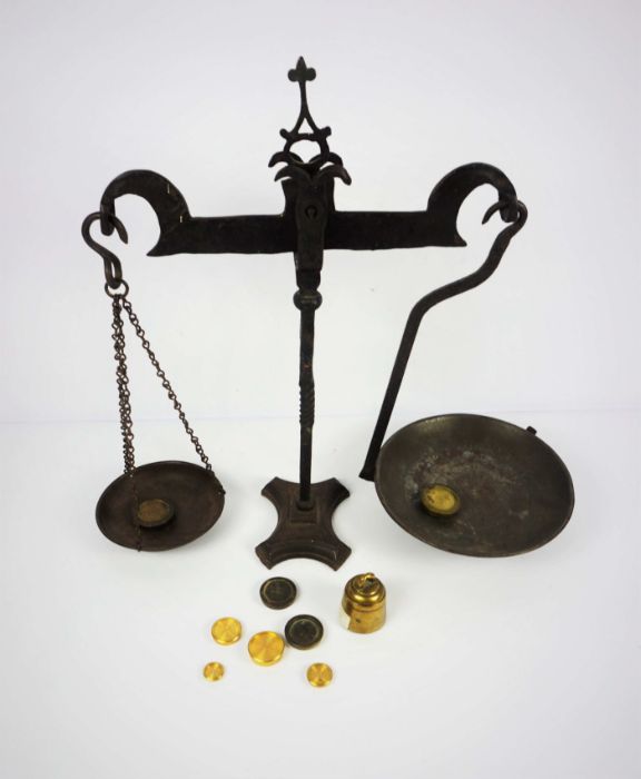 A wrought iron set of balance scales, 19th century, with nine assorted and graduated weights (10) - Image 2 of 6
