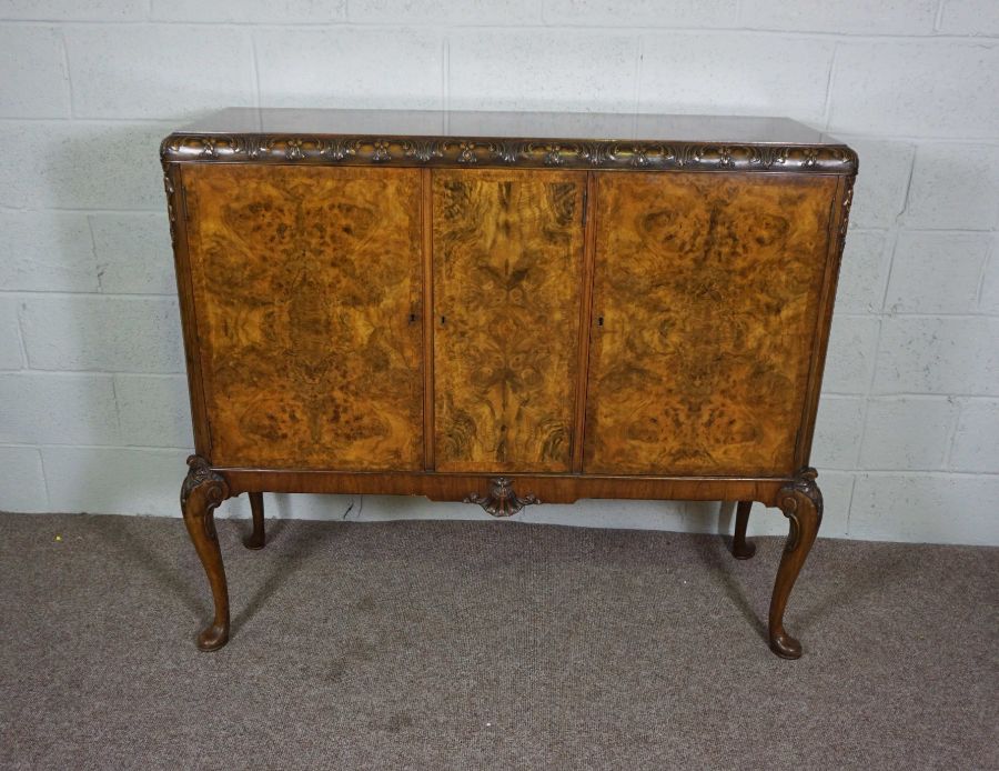 A George II style walnut veneered side cabinet, 20th century reproduction, the moulded top with - Image 5 of 8