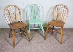 Three provincial elm and ash Kitchen hoop backed chairs, with stick backs and turned legs, one later