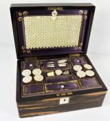 An early Victorian coromandel sewing box, circa 1840, the case opening to reveal a fitted