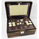 An early Victorian coromandel sewing box, circa 1840, the case opening to reveal a fitted