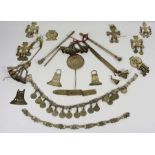 A collection of assorted white metal, believed to be Native American Trade Silver, including a