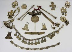 A collection of assorted white metal, believed to be Native American Trade Silver, including a