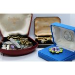 Quantity of costume jewellery, including a Royal Albert china flower brooch, a silver chain,