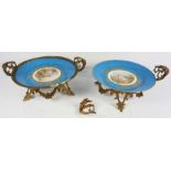 Two Sevres decorative porcelain plates with gilt metal mounts (one damaged), together with ten