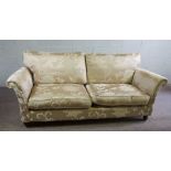 Two three seat cream upholstered damask sofas, 218cm long