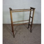 An Edwardian mahogany towel rail, 88cm high, 69cm side