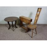 A small 19th century spinning chair, the back and seat later decorated with a dragon, together