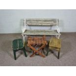 A small modern garden bench, together with two small stools and a folding hardwood stool (40