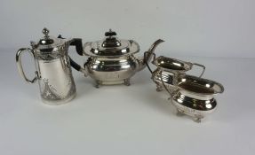 A Victorian style silver plated three piece tea set, together with an associated coffee pot (4)