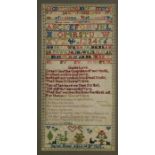 A Victorian woodwork sampler, by Sarah Wood, aged 14, dated 1863, decorated with the alphabet,