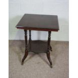 A mahogany centre table, circa 1900, with square moulded top, on turned supports, with undertier and