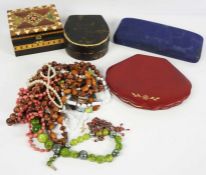 A quantity of assorted costume jewellery, strings of beads, simulated pearls, cuff links and related