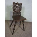 An oak hall chair, with crowned double eagle carved back, 19th century, by repute from Thurso