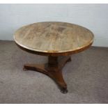 A William IV rosewood tilt top breakfast table, circa 1830, the circular top set on a pedestal