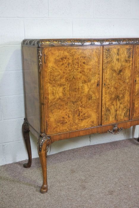 A George II style walnut veneered side cabinet, 20th century reproduction, the moulded top with - Image 6 of 8