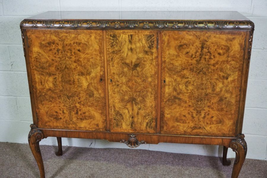 A George II style walnut veneered side cabinet, 20th century reproduction, the moulded top with - Image 8 of 8